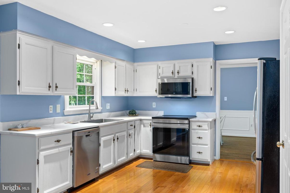 Interior, Kitchen, Recessed Lighting, Stainless Steel Appliances, Wood Texture Flooring