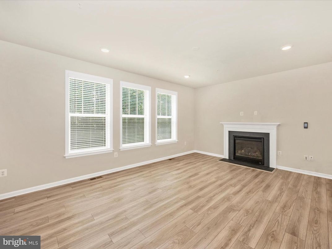 Empty room, Fireplace, Interior, Recessed Lighting, Wood Texture Flooring