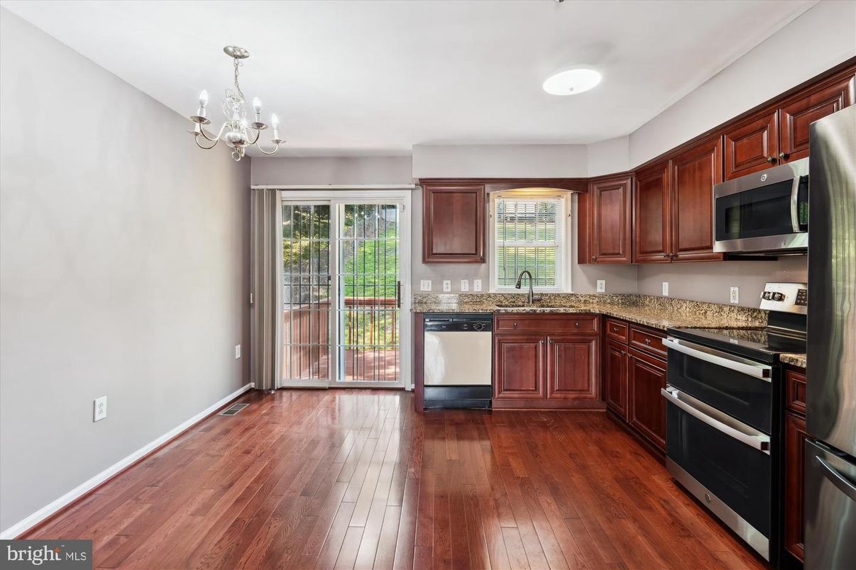 Chandelier, Interior, Kitchen, Recessed Lighting, Stainless Steel Appliances, Wood Texture Flooring