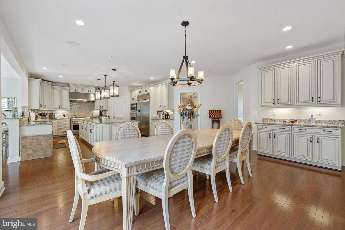 Chandelier, Dining room, Interior, Kitchen, Pendant Lights, Recessed Lighting, Stainless Steel Appliances, Wood Texture Flooring
