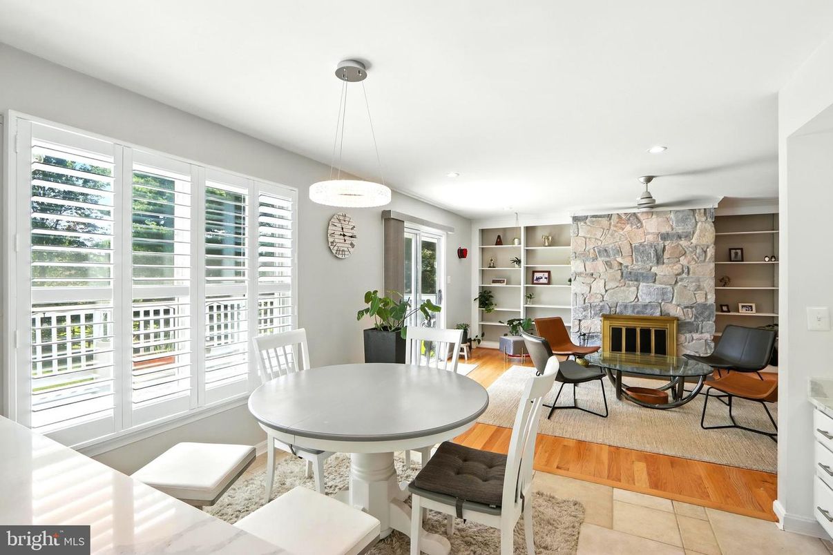 Dining room, Fireplace, Interior, Pendant Lights, Recessed Lighting, Wood Texture Flooring
