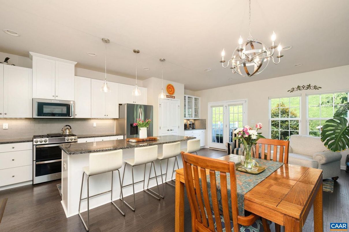 Chandelier, Dining room, Interior, Kitchen, Pendant Lights, Recessed Lighting, Stainless Steel Appliances, Wood Texture Flooring