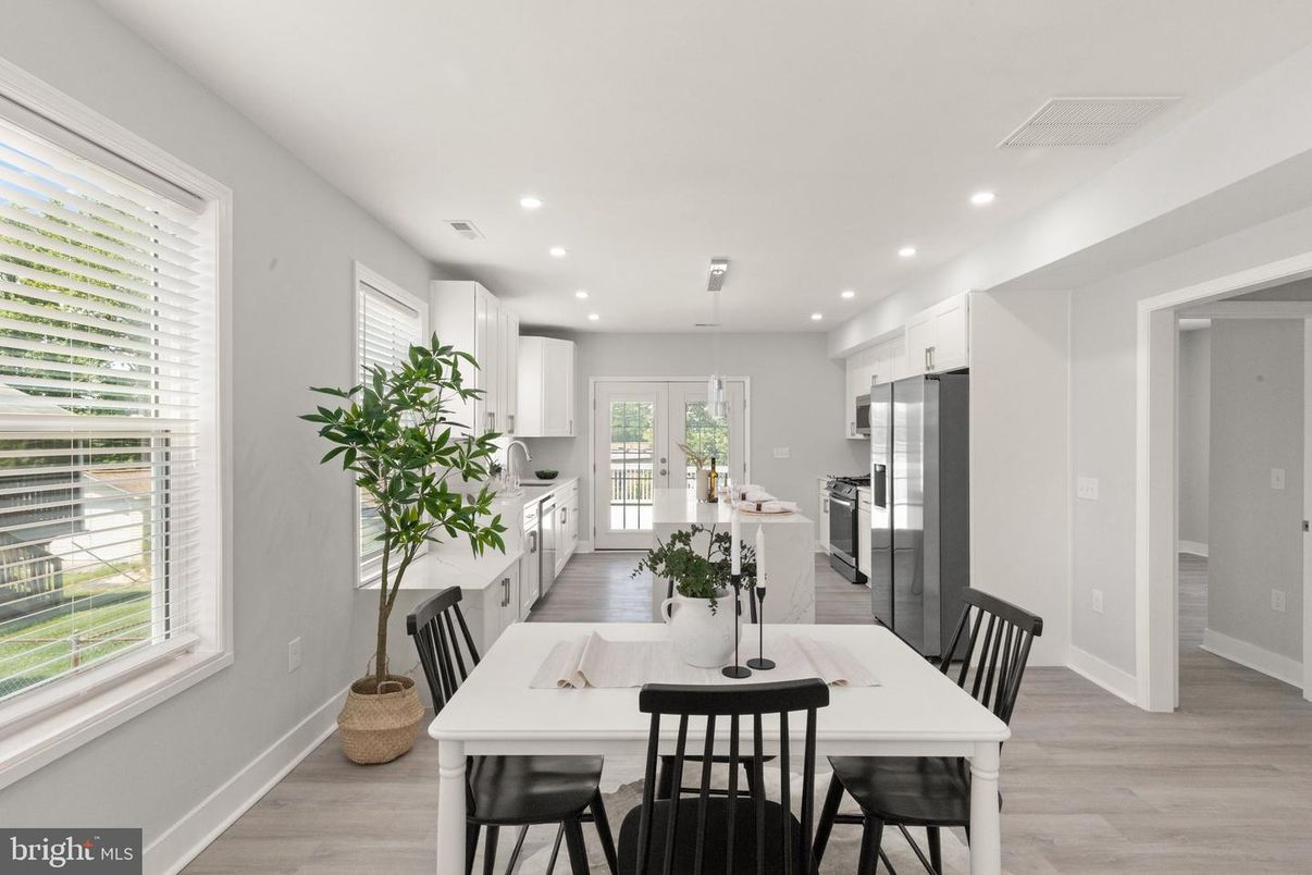 Dining room, Interior, Kitchen, Recessed Lighting, Stainless Steel Appliances, Wood Texture Flooring