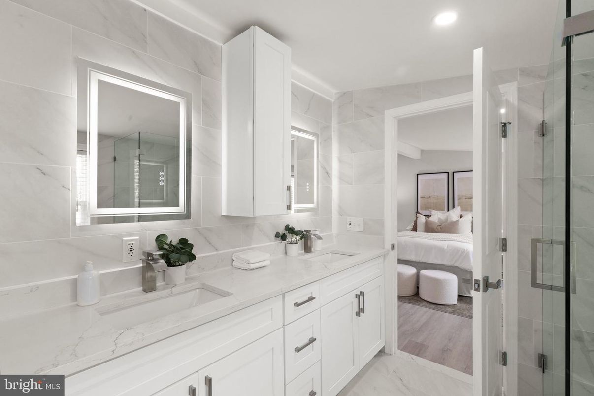 Bathroom, Bedroom, Dual Sink Vanities, Glass Shower, Interior, Marble, Marble Walls, Recessed Lighting, Wood Texture Flooring