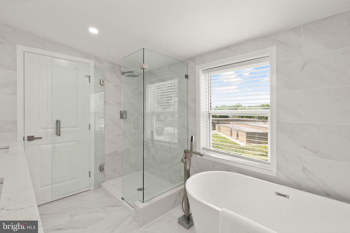 Bathroom, Free Standing Baths, Glass Shower, Interior, Marble, Marble Walls, Recessed Lighting