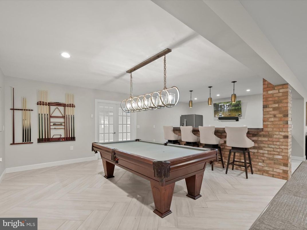 Billiard Table, Chandelier, Game Room, Interior, Pendant Lights, Recessed Lighting, Stone Walls, Wood Texture Flooring