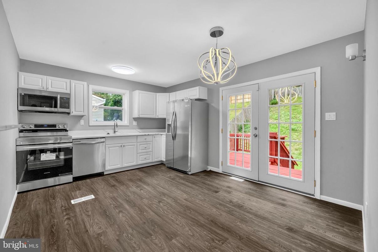 Interior, Kitchen, Pendant Lights, Stainless Steel Appliances, Wood Texture Flooring