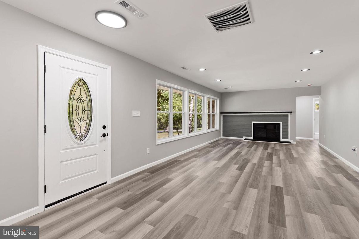 Empty room, Fireplace, Interior, Recessed Lighting, Wood Texture Flooring