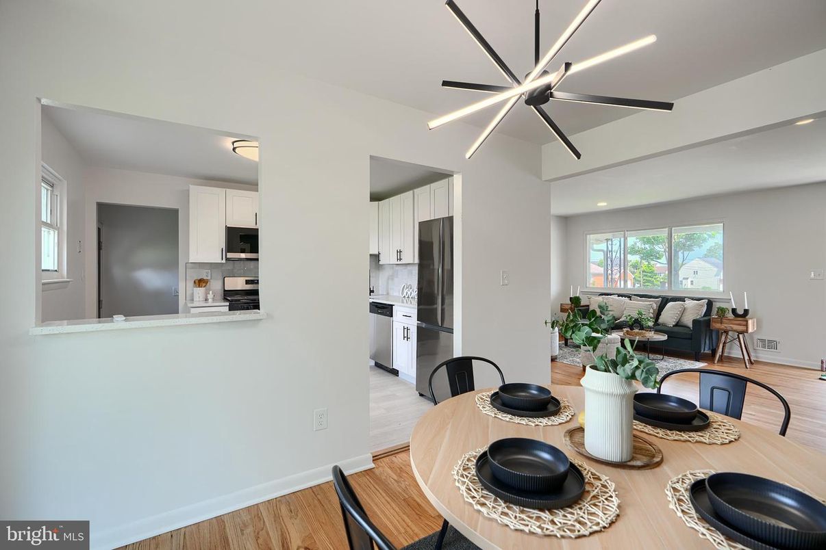 Dining room, Interior, Kitchen, Pendant Lights, Recessed Lighting, Stainless Steel Appliances, Wood Texture Flooring