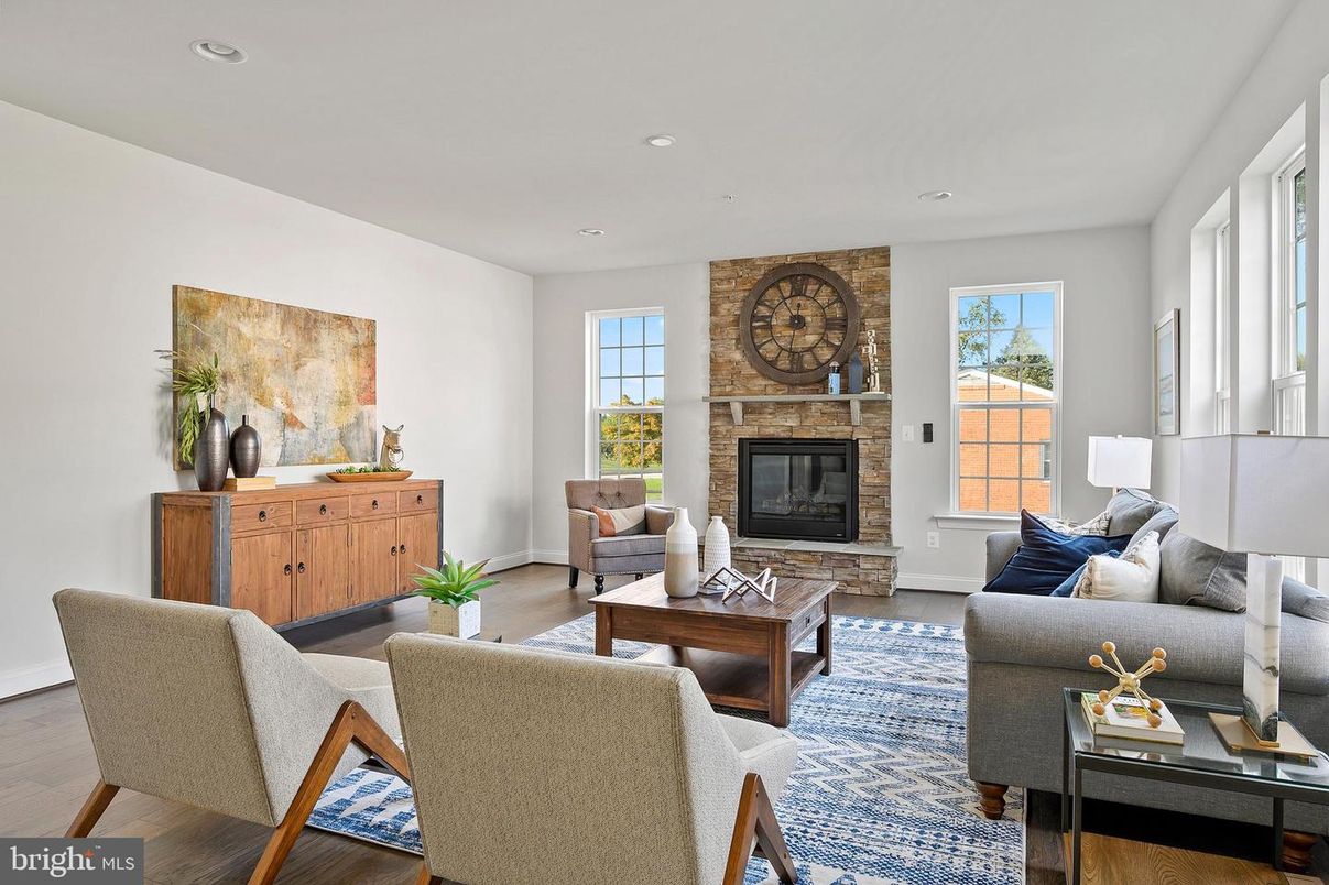 Fireplace, Interior, Living room, Recessed Lighting, Stone Walls, Wood Texture Flooring