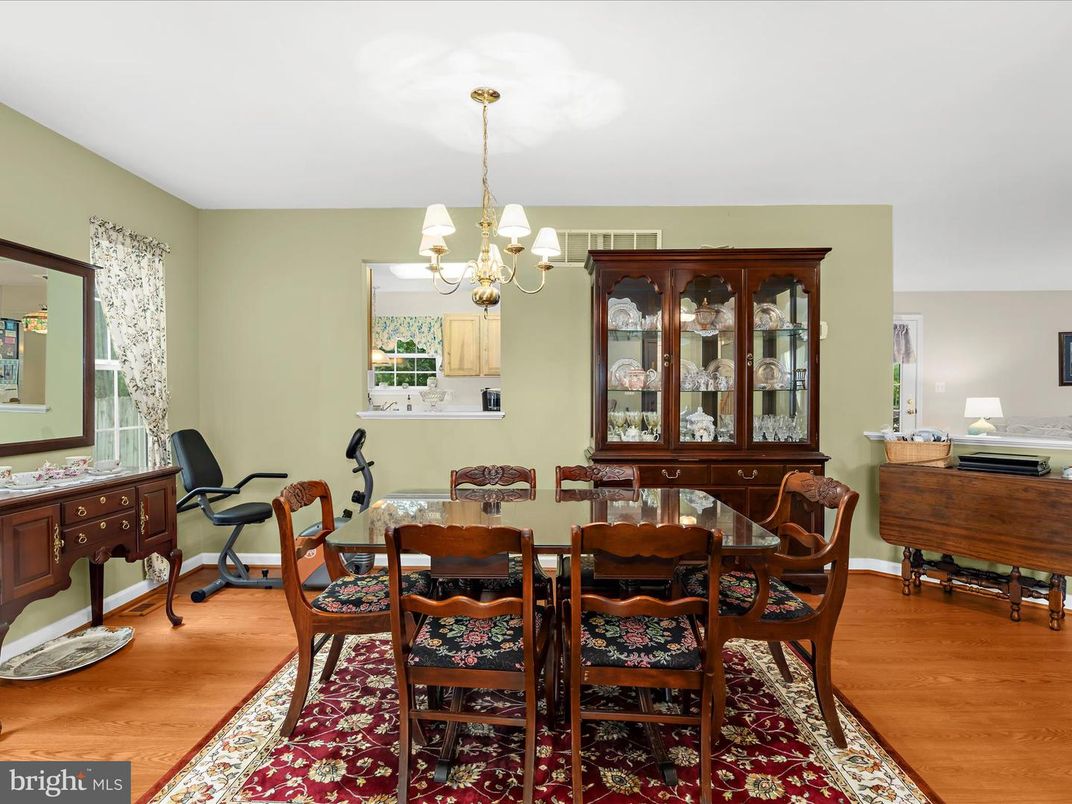 Chandelier, Dining room, Interior, Piano, Wood Texture Flooring