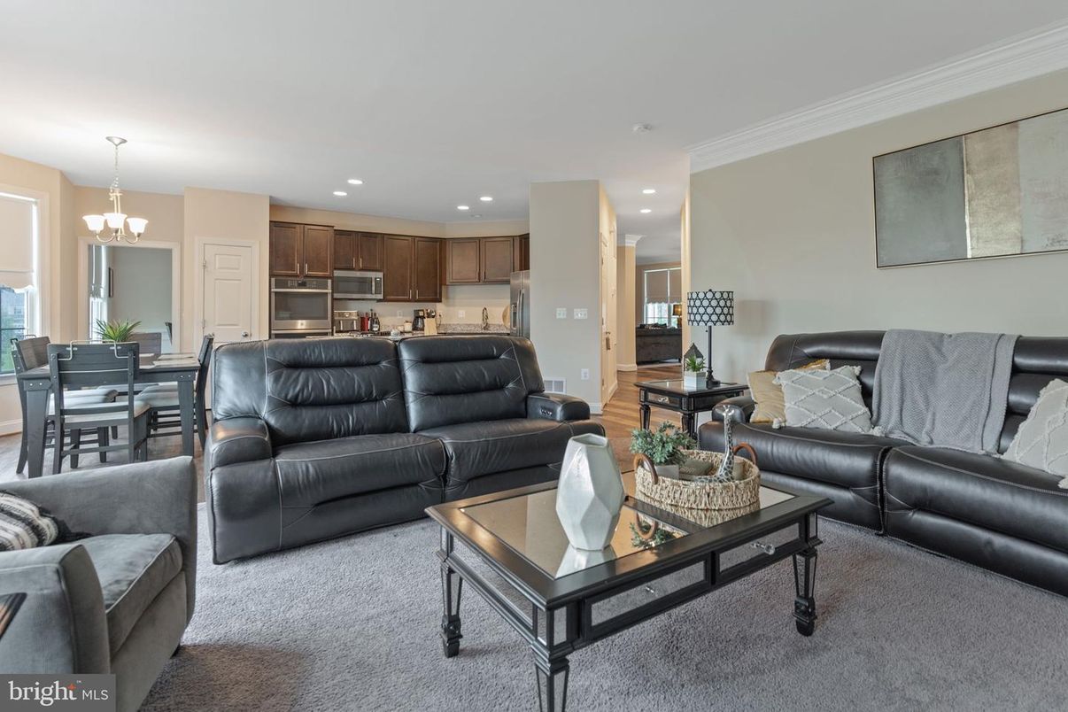 Chandelier, Dining room, Interior, Kitchen, Living room, Recessed Lighting, Stainless Steel Appliances, Wood Texture Flooring