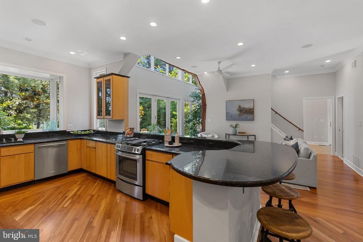 Dining room, Interior, Kitchen, Recessed Lighting, Stainless Steel Appliances, Wood Texture Flooring