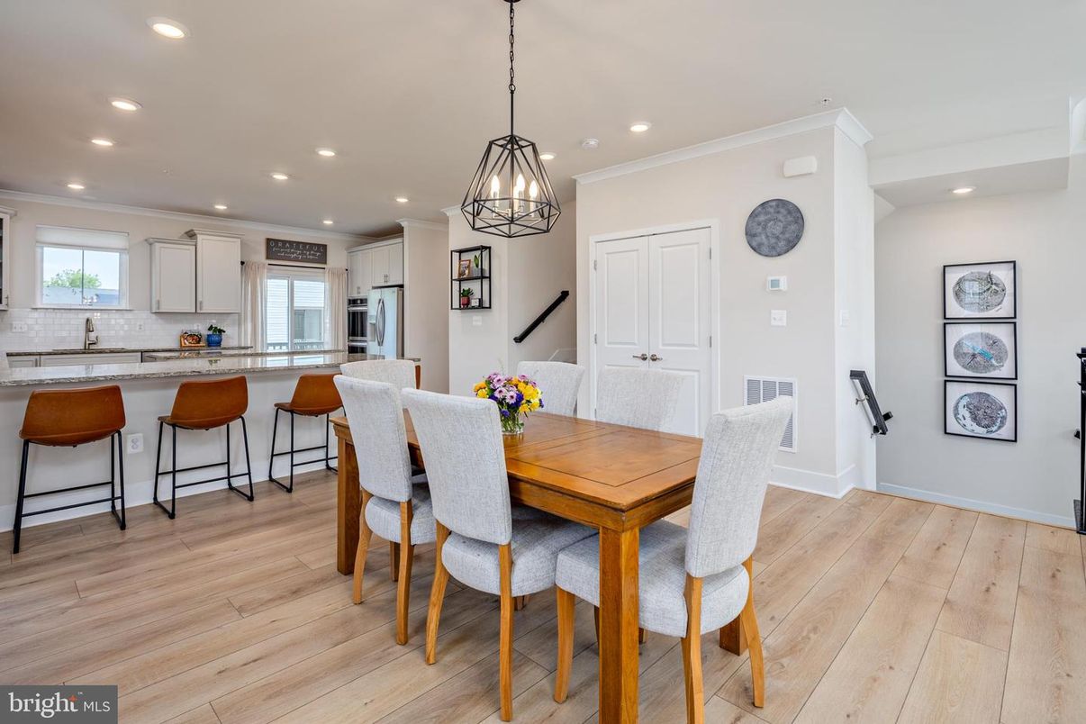 Dining room, Interior, Kitchen, Pendant Lights, Recessed Lighting, Stainless Steel Appliances, Wood Texture Flooring