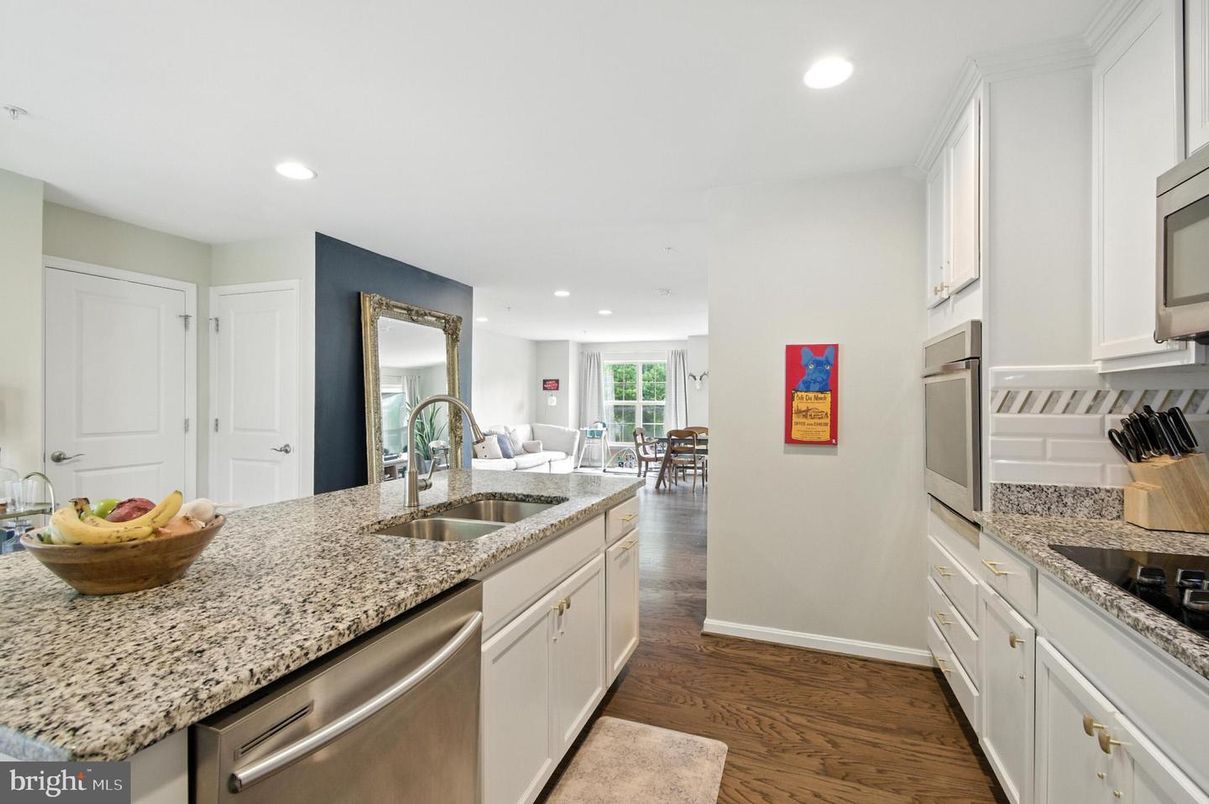 Dining room, Interior, Kitchen, Recessed Lighting, Stainless Steel Appliances, Wood Texture Flooring
