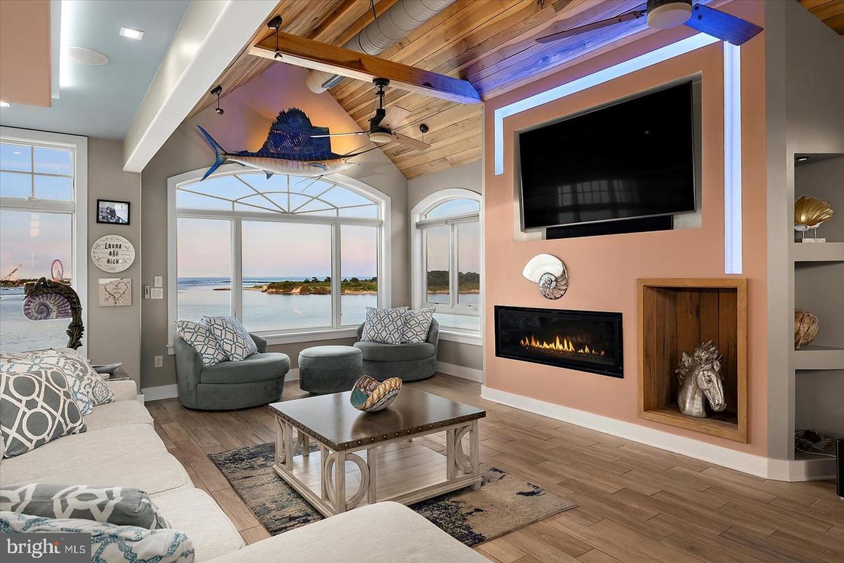 Fireplace, Interior, Living room, Recessed Lighting, Water, Wooden Ceilings, Wood Texture Flooring