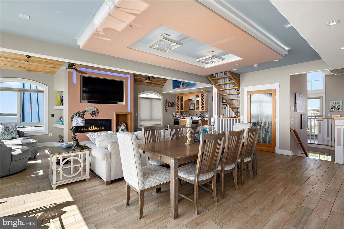 Dining room, Fireplace, Interior, Living room, Recessed Lighting, Wood Texture Flooring