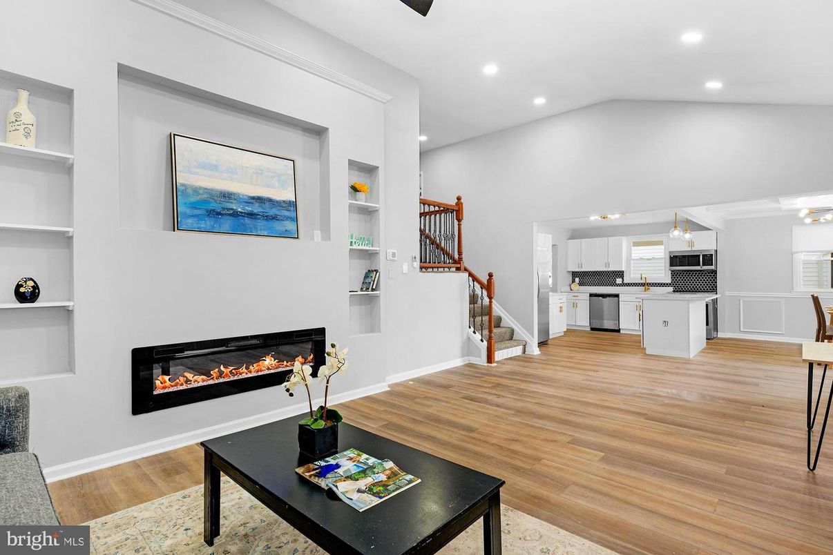 Fireplace, Interior, Kitchen, Living room, Recessed Lighting, Wood Texture Flooring