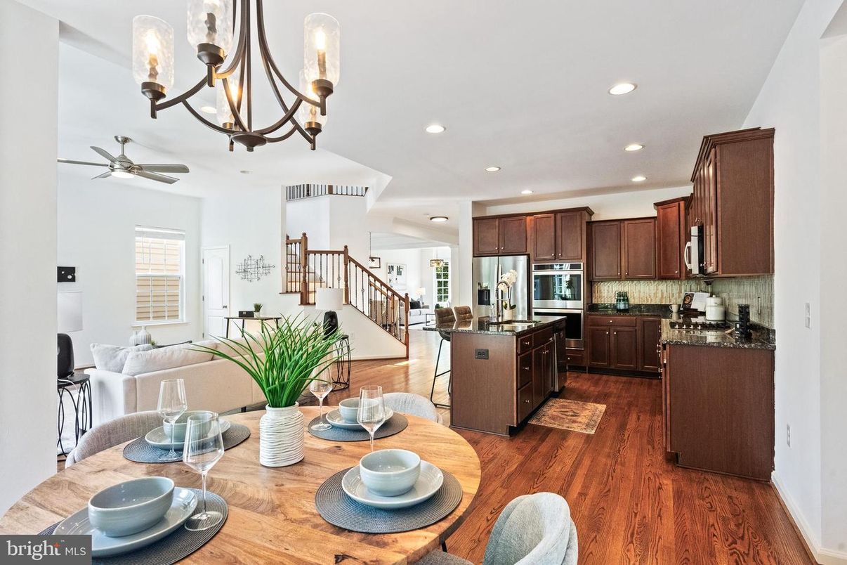 Chandelier, Dining room, Interior, Kitchen, Recessed Lighting, Stainless Steel Appliances, Wood Texture Flooring