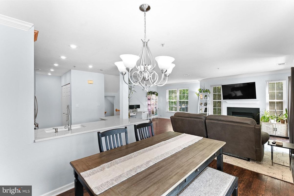 Chandelier, Dining room, Fireplace, Interior, Living room, Recessed Lighting, Wood Texture Flooring