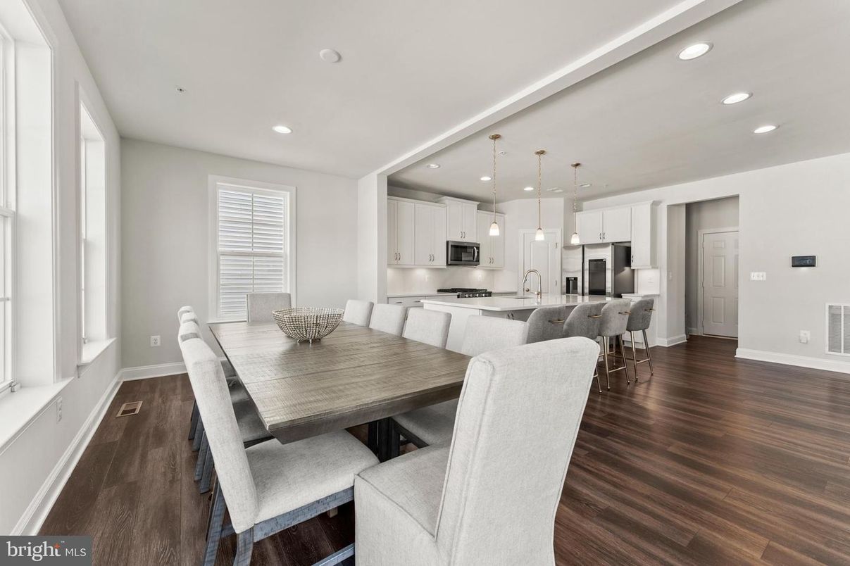 Dining room, Interior, Kitchen, Pendant Lights, Recessed Lighting, Stainless Steel Appliances, Wood Texture Flooring