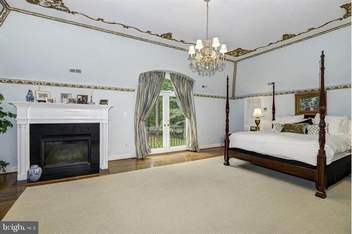 Bedroom, Chandelier, Fireplace, Interior, Wood Texture Flooring