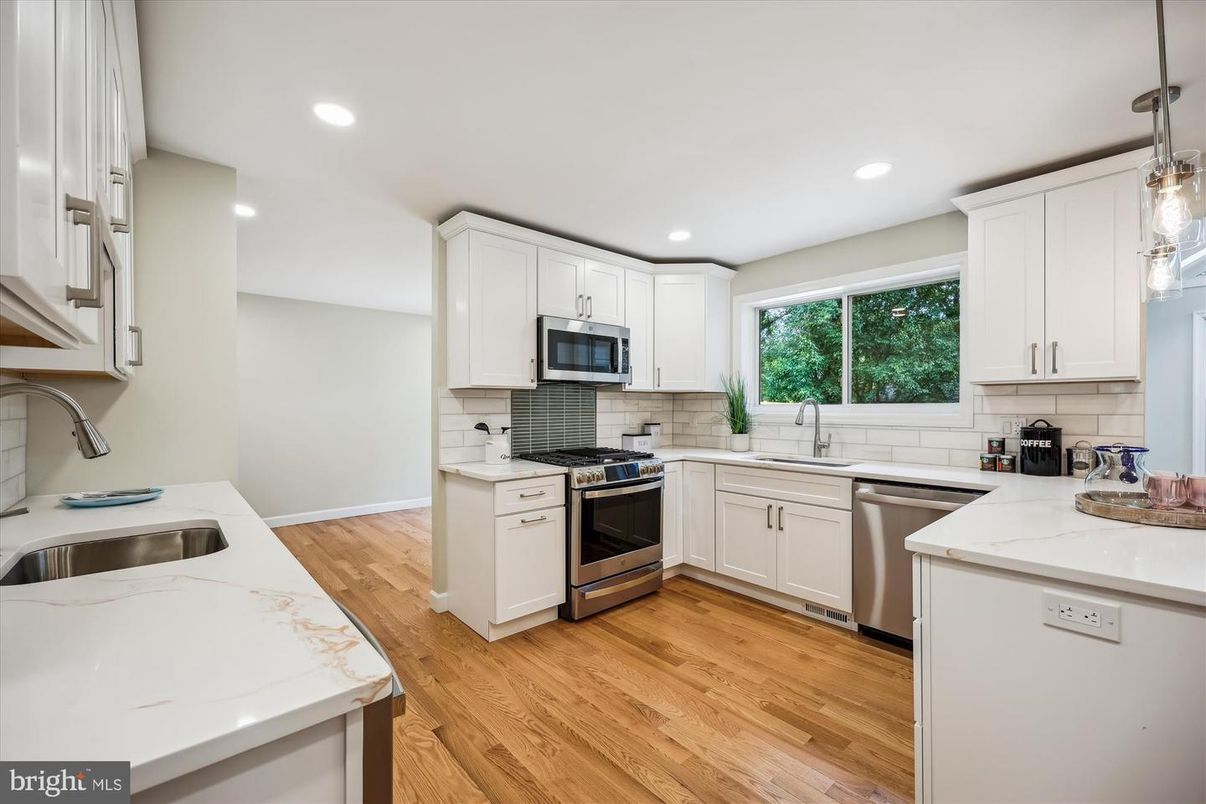 Interior, Kitchen, Pendant Lights, Recessed Lighting, Stainless Steel Appliances, Wood Texture Flooring