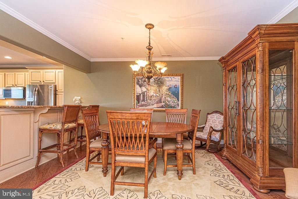Chandelier, Dining room, Interior, Kitchen, Recessed Lighting, Stainless Steel Appliances, Wood Texture Flooring