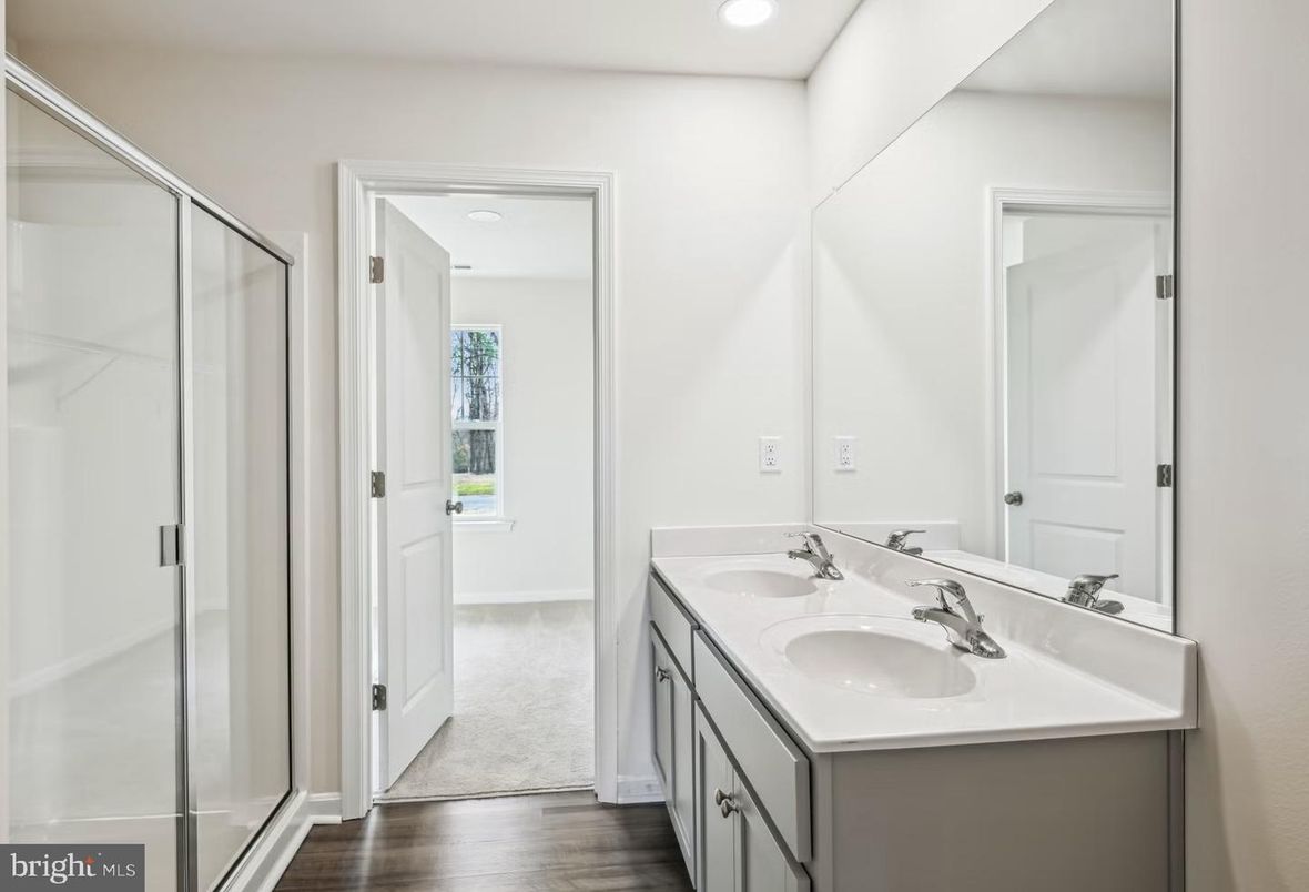 Bathroom, Dual Sink Vanities, Glass Shower, Interior, Recessed Lighting, Wood Texture Flooring