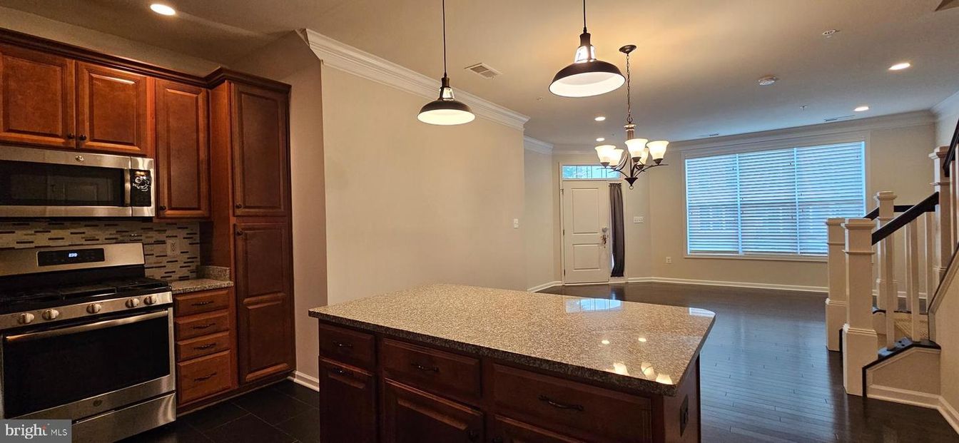 Chandelier, Interior, Kitchen, Pendant Lights, Recessed Lighting, Stainless Steel Appliances, Wood Texture Flooring