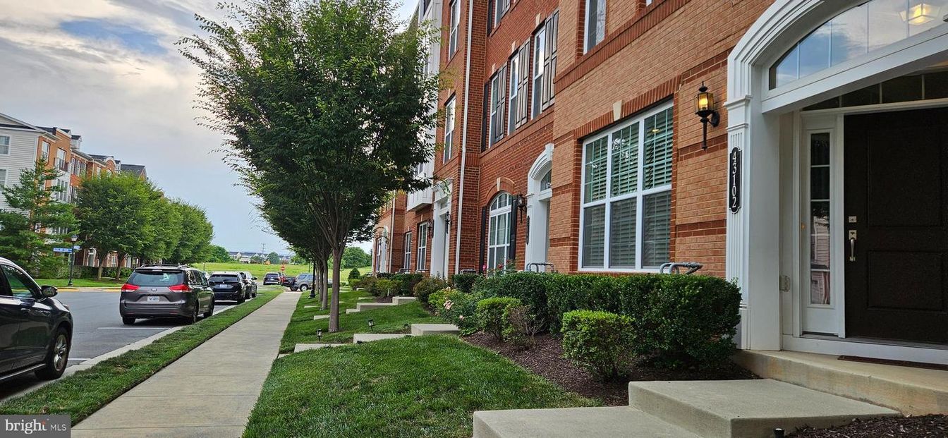 Exterior, Facade, Brick Facade, Condo Building