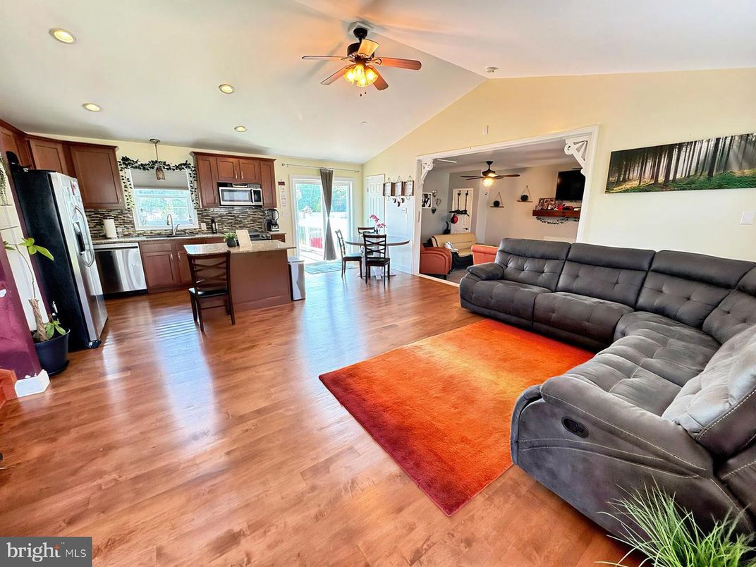 Dining room, Interior, Kitchen, Living room, Recessed Lighting, Stainless Steel Appliances, Wood Texture Flooring