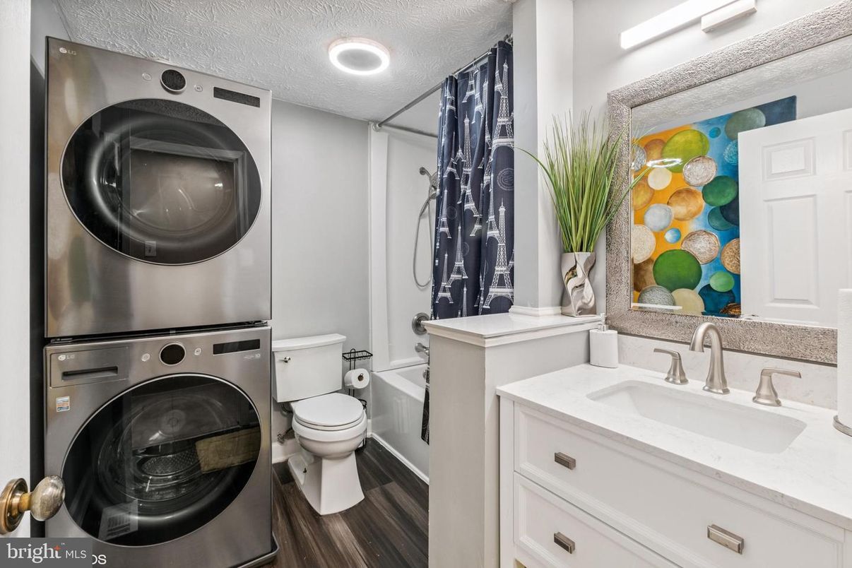 Bathroom, Interior, Recessed Lighting, Utility Closets, Washer, Wood Texture Flooring