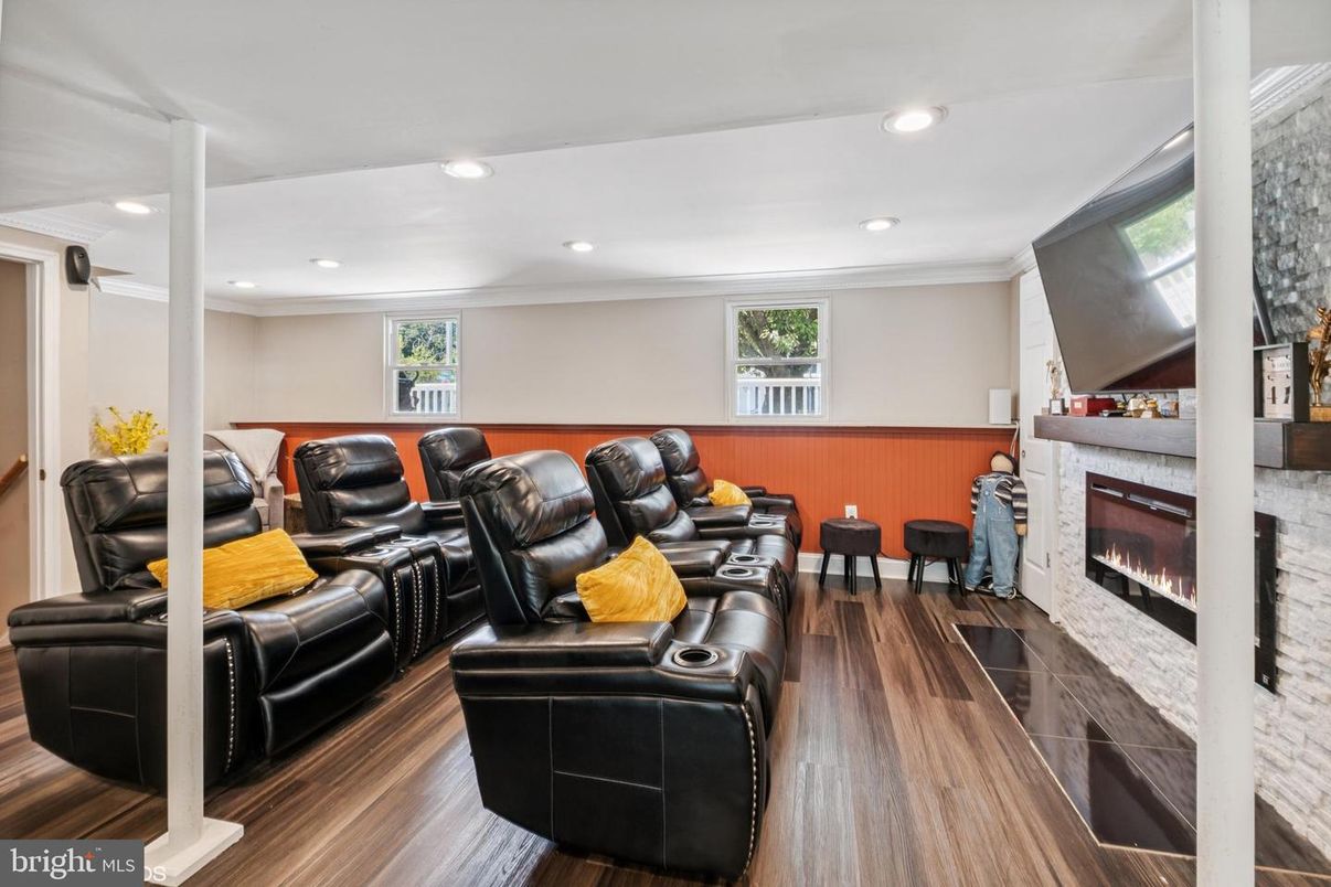 Home Theatre Room, Fireplace, Interior, Living room, Recessed Lighting, Theatre Room, Wood Texture Flooring