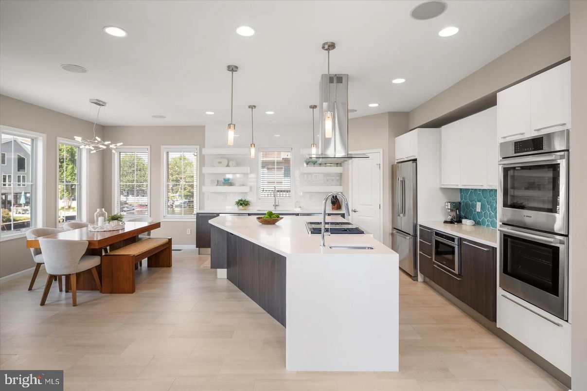 Dining room, Interior, Kitchen, Pendant Lights, Recessed Lighting, Stainless Steel Appliances, Wood Texture Flooring
