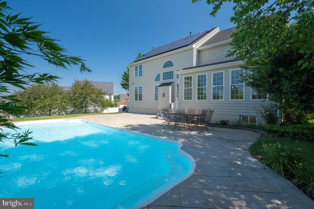 Exterior, Pool, Solar Panels
