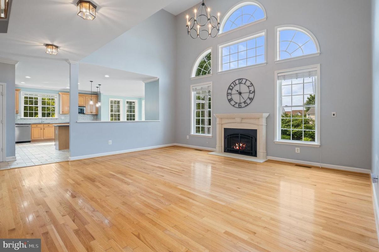 Chandelier, Empty room, Fireplace, Interior, Pendant Lights, Wood Texture Flooring
