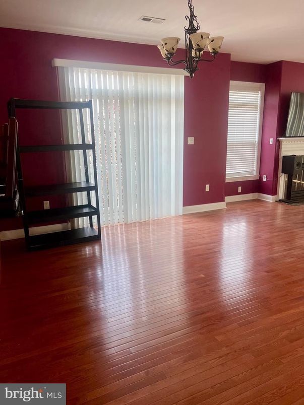 Chandelier, Empty room, Fireplace, Interior, Wood Texture Flooring