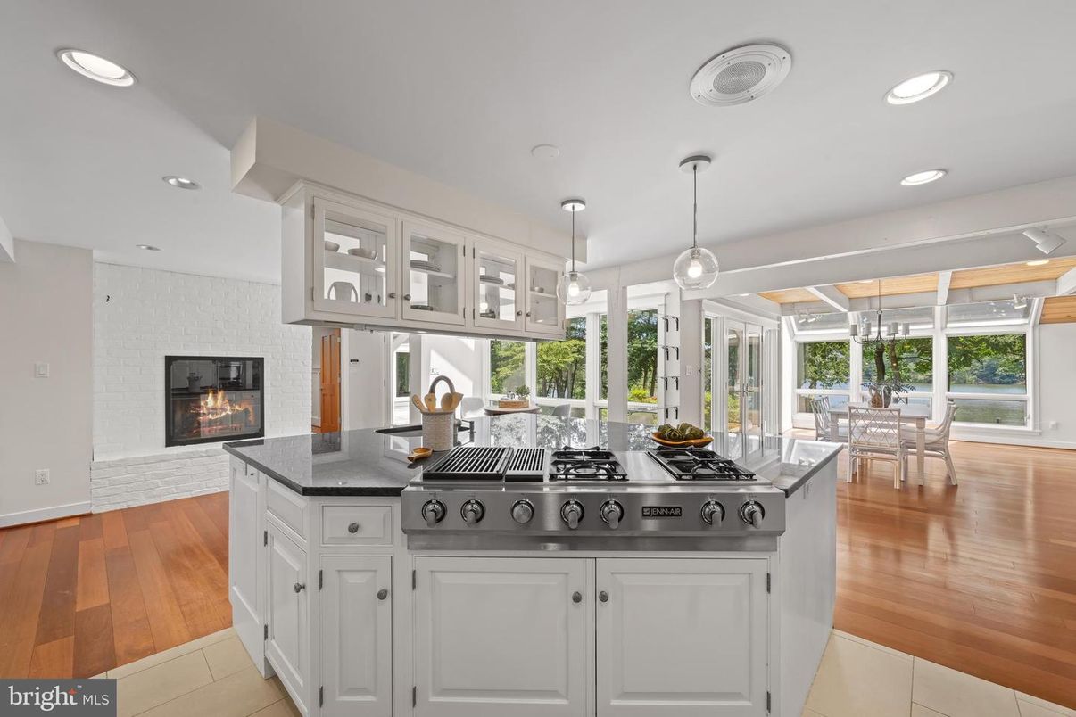 Dining room, Fireplace, Interior, Kitchen, Pendant Lights, Recessed Lighting, Wood Texture Flooring