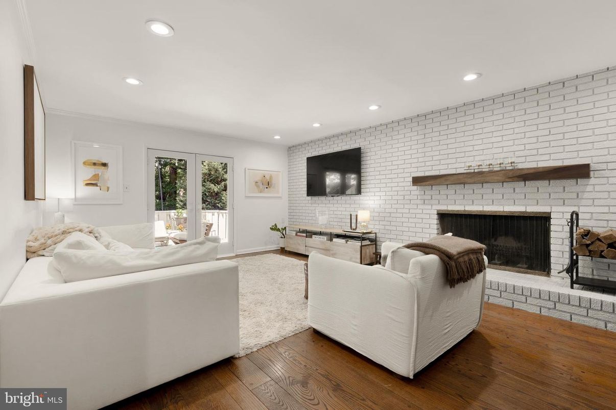 Fireplace, Interior, Living room, Recessed Lighting, Stone Walls, Wood Texture Flooring