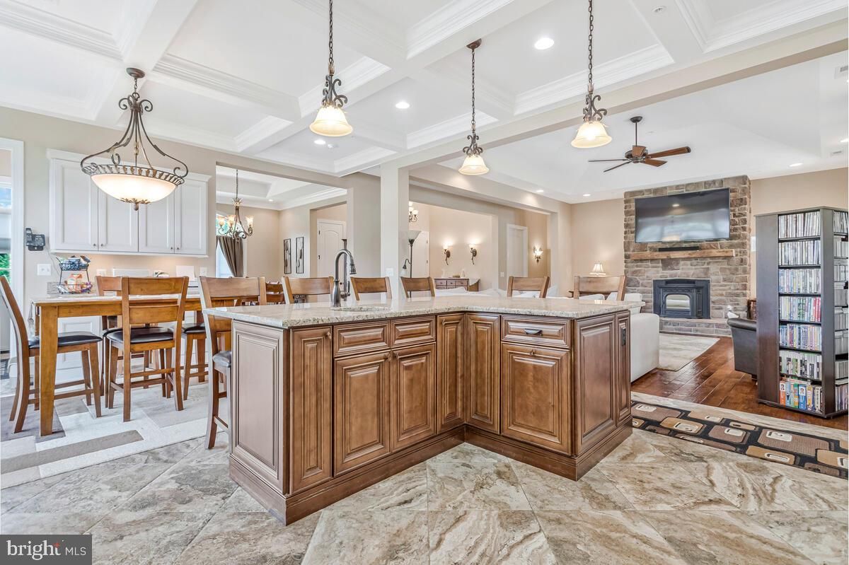 Dining room, Fireplace, Interior, Kitchen, Living room, Pendant Lights, Recessed Lighting, Stone Walls, Wood Texture Flooring