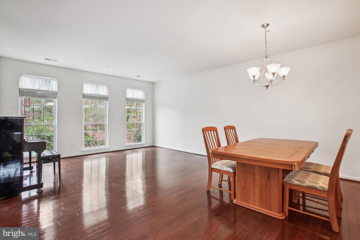 Chandelier, Dining room, Interior, Piano, Wood Texture Flooring