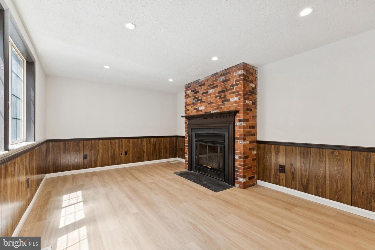 Empty room, Fireplace, Interior, Recessed Lighting, Wood Texture Flooring, Wooden Walls