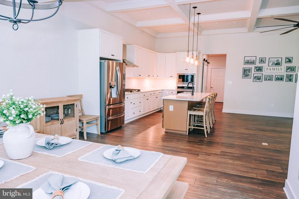 Dining room, Interior, Kitchen, Pendant Lights, Recessed Lighting, Stainless Steel Appliances, Wood Texture Flooring