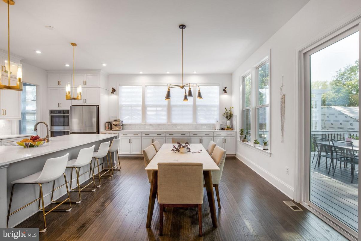 Dining room, Interior, Kitchen, Pendant Lights, Recessed Lighting, Stainless Steel Appliances, Wood Texture Flooring