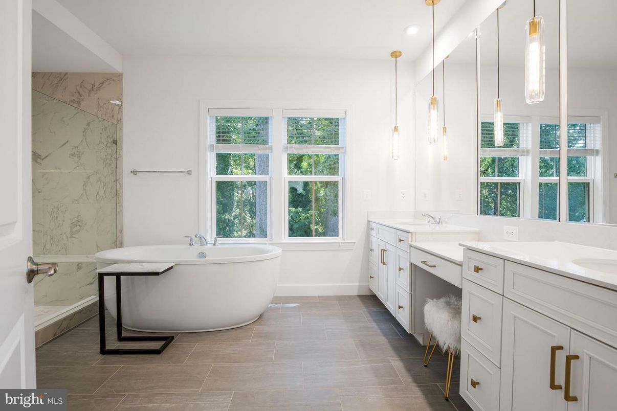 Bathroom, Dual Sink Vanities, Free Standing Baths, Interior, Marble Walls, Pendant Lights