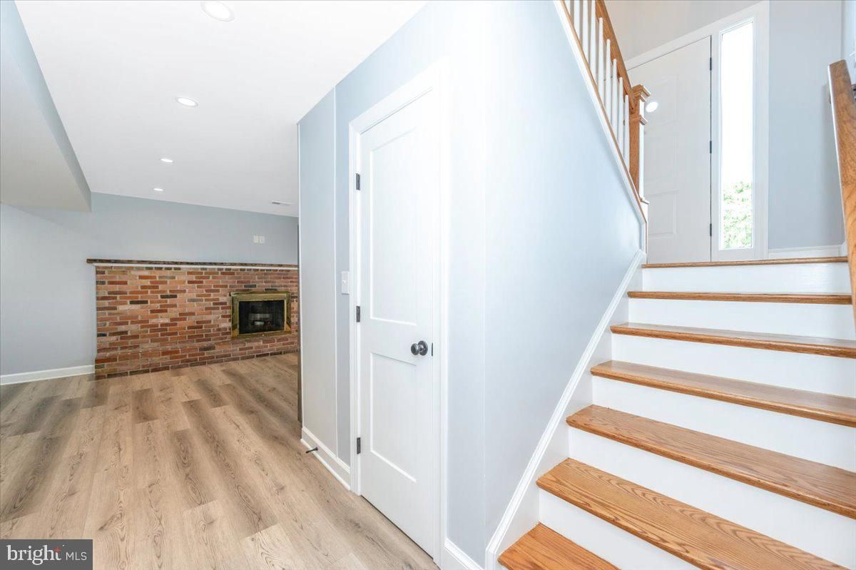 Fireplace, Interior, Recessed Lighting, Stone Walls, Wood Texture Flooring
