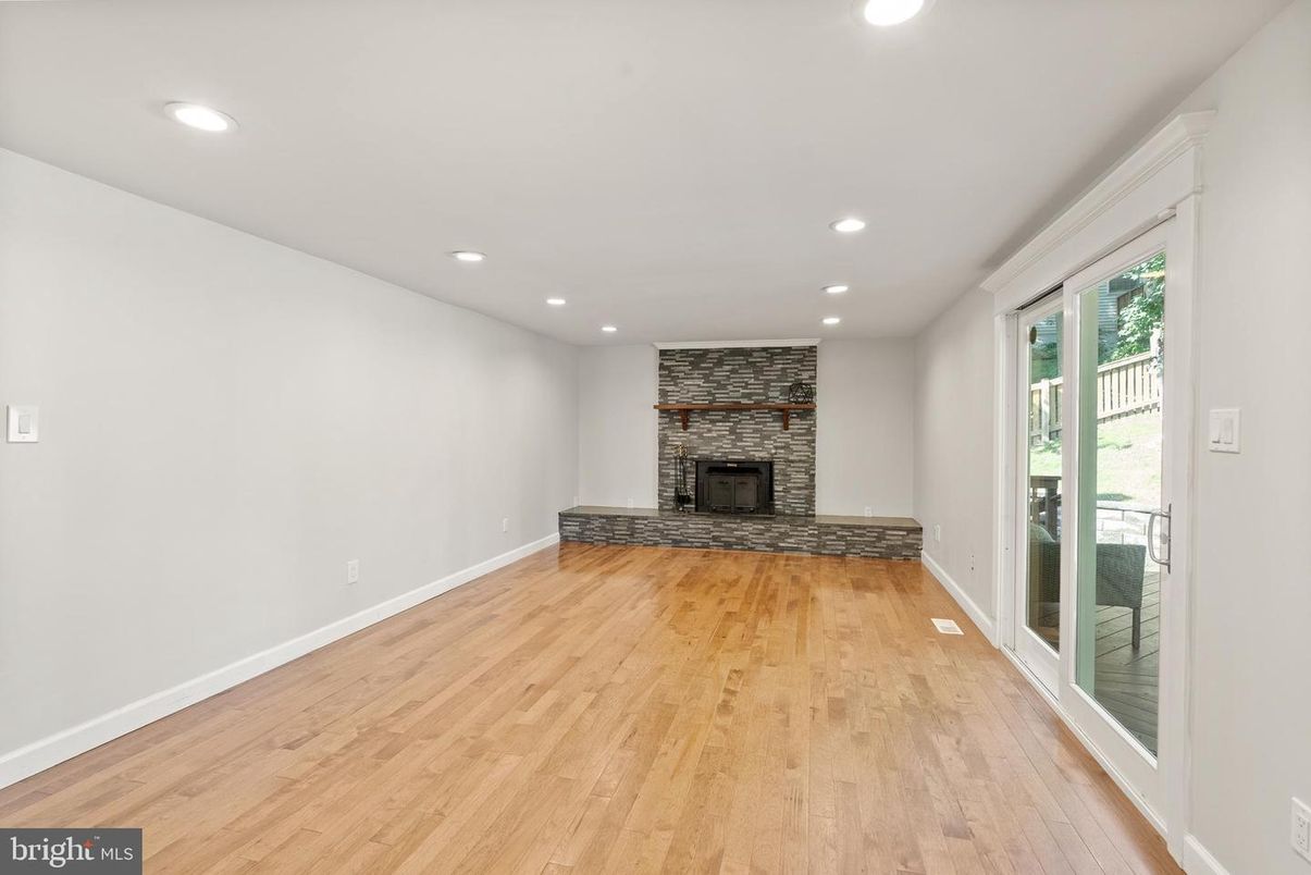 Empty room, Fireplace, Interior, Recessed Lighting, Wood Texture Flooring