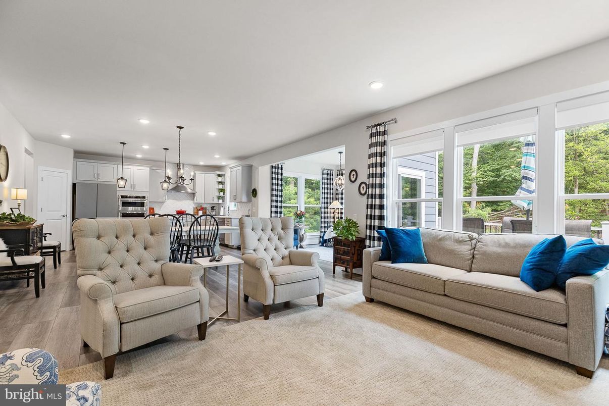 Dining room, Interior, Kitchen, Living room, Pendant Lights, Recessed Lighting, Stainless Steel Appliances, Wood Texture Flooring