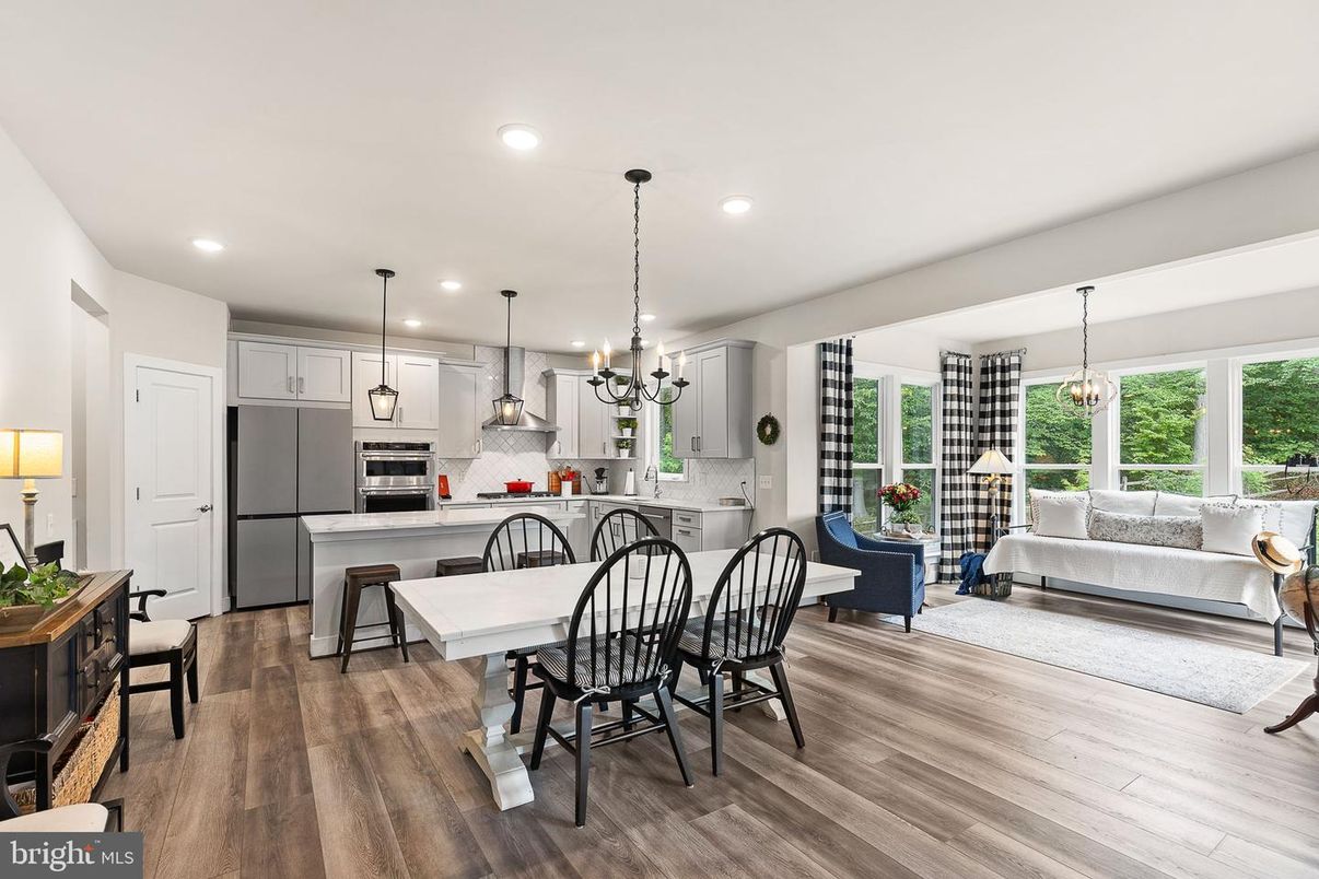 Dining room, Interior, Kitchen, Living room, Pendant Lights, Recessed Lighting, Stainless Steel Appliances, Wood Texture Flooring